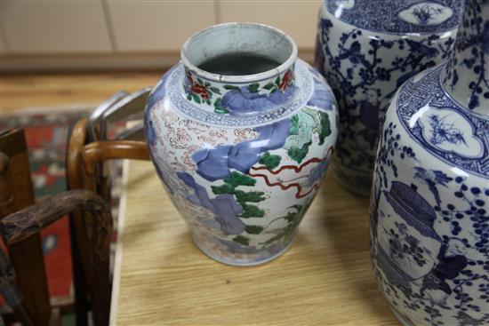A pair of 19th century Chinese blue and white vases and a wucai jar, repaired 49, 46, 29.5cm